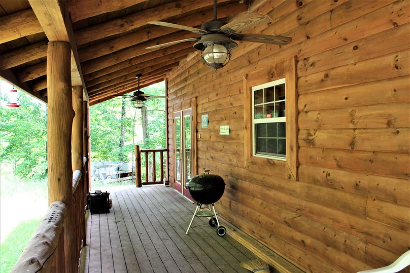 045 covered back deck with entrance to the dining and kitchen areas perfect for grilling that evening meal
