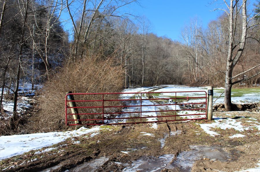 005 the gated entrance leaving the blacktop road