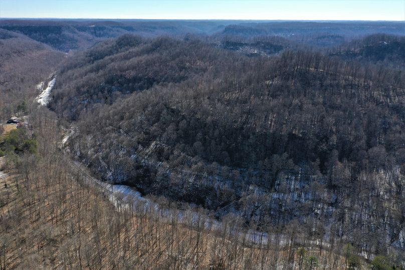 016 aerial drone shot from the east boundary looking west across the valley, notice the cliff line at specific elevations