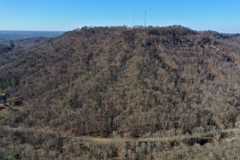 001 aerial drone shot from the southeast boundary along KY 11 looking northwest