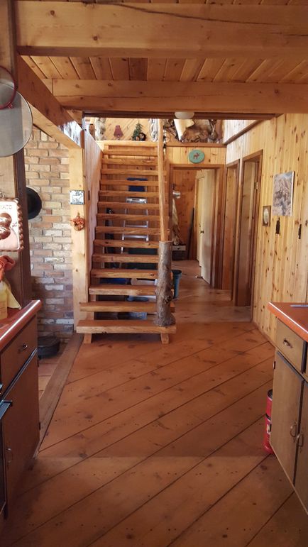 wood floors and stairs to loft
