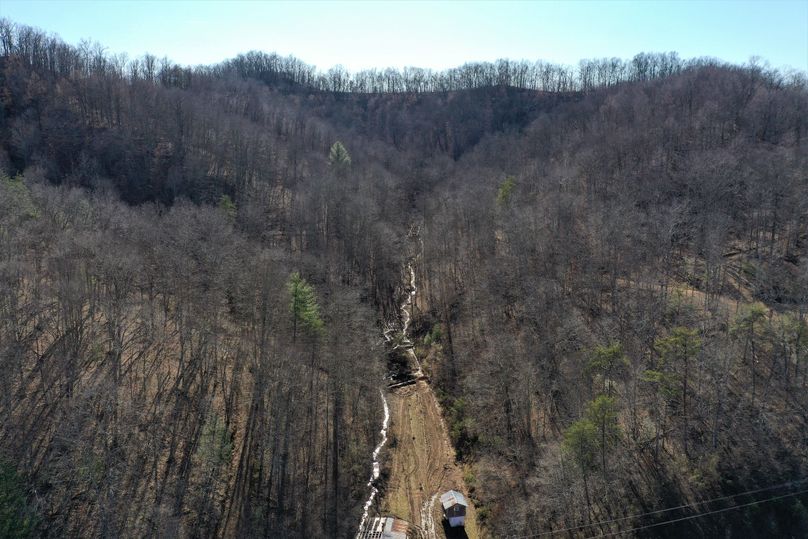 001 aerial drone shot from the north boundary along KY 15 looking south up the valley