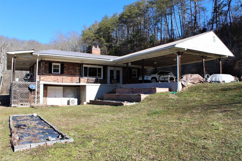 030 view of the home and carport from the south part of the yard