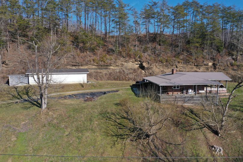 011 low elevation drone shot of the home and shop