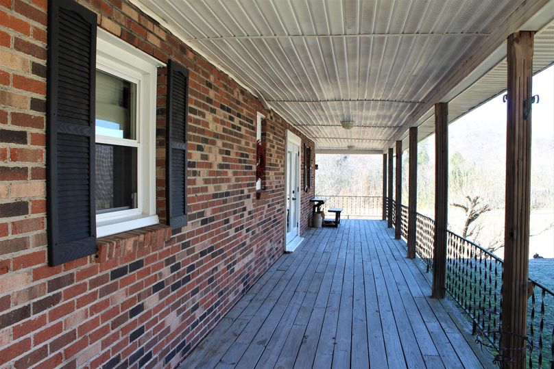 031 the covered porch on the north side of the home near the kitchen