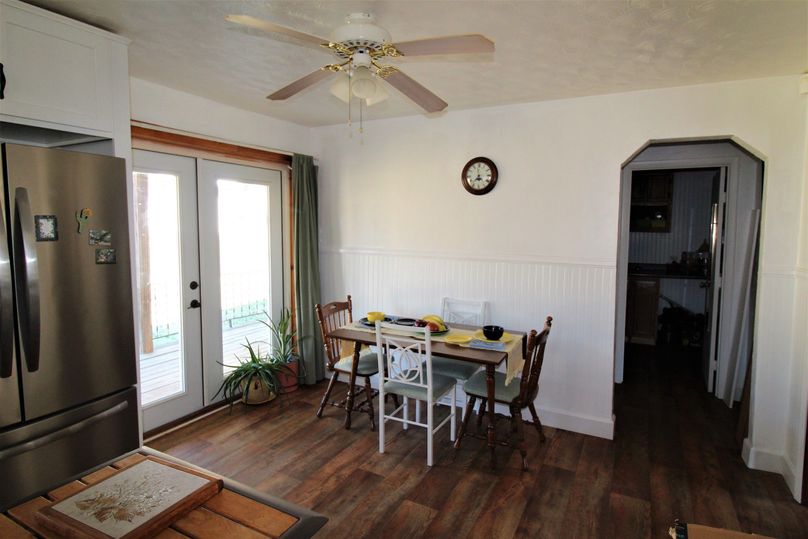 033 the kitchen_dining area and entry way from the porch