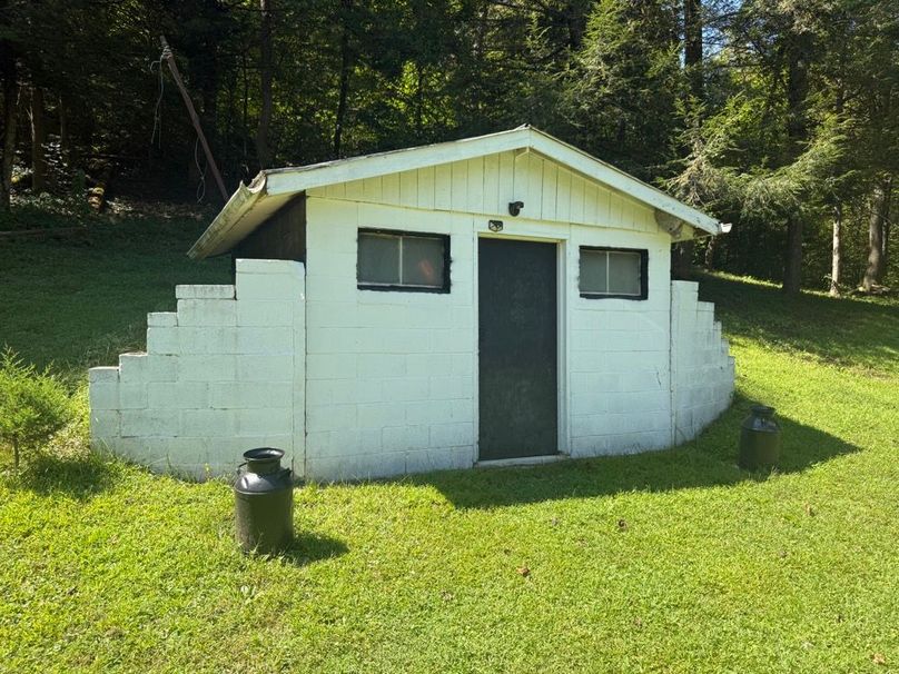 016 the cellar that sits on the small building lot across the road