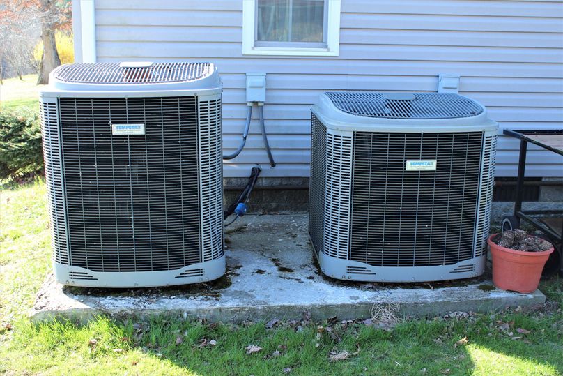 037 the two outdoor units that heat and cool the home
