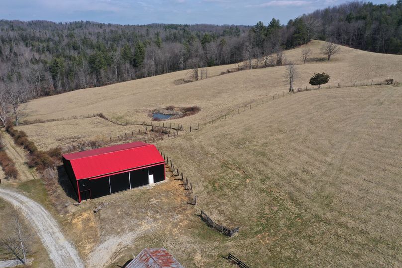 010 large newly built pole barn designed for livestock with much of the pasture fenced