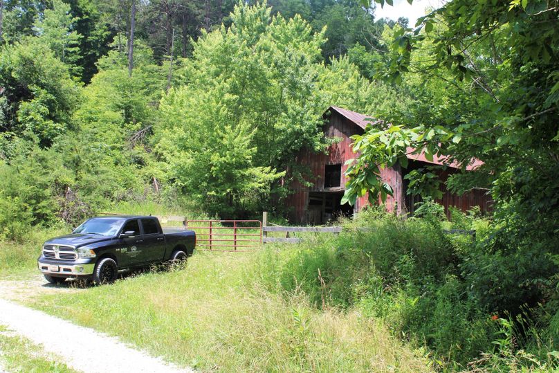016 another view of the gated entrance to the barn and secondary hollow