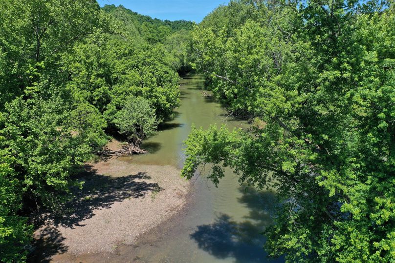 007 cool low elevation aerial drone shot looking northwest down the river