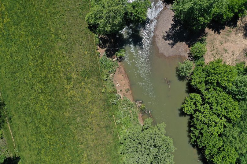 021 cool aerial drone shot looking straight down on the river
