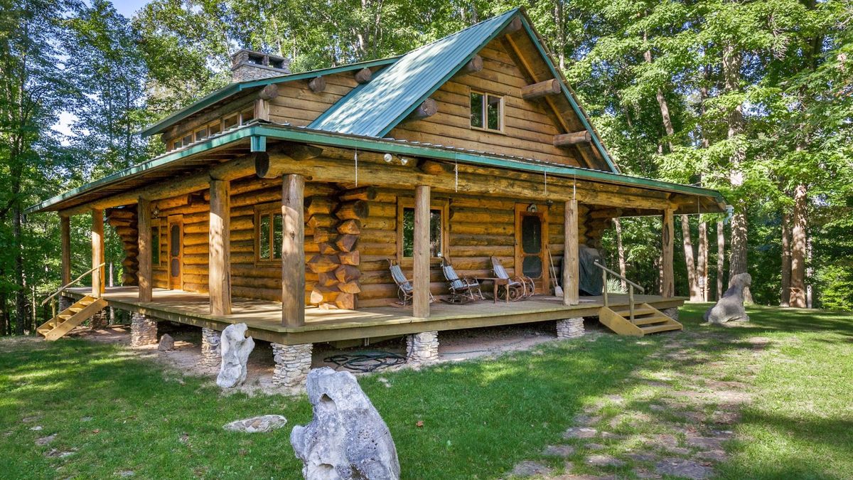 Custom Log Home With Acreage In A Private And Secluded Setting