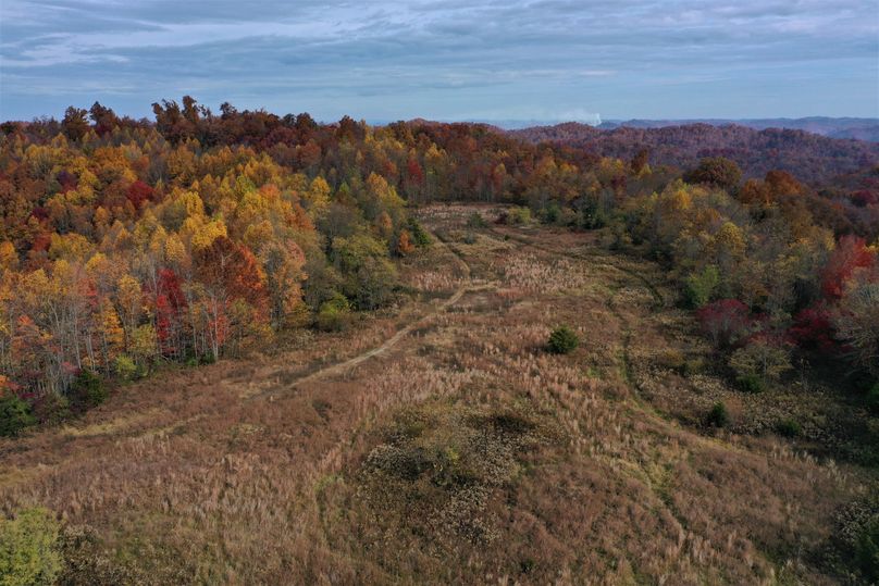027 aerial drone shot of the open field ridge along the southeast boundary