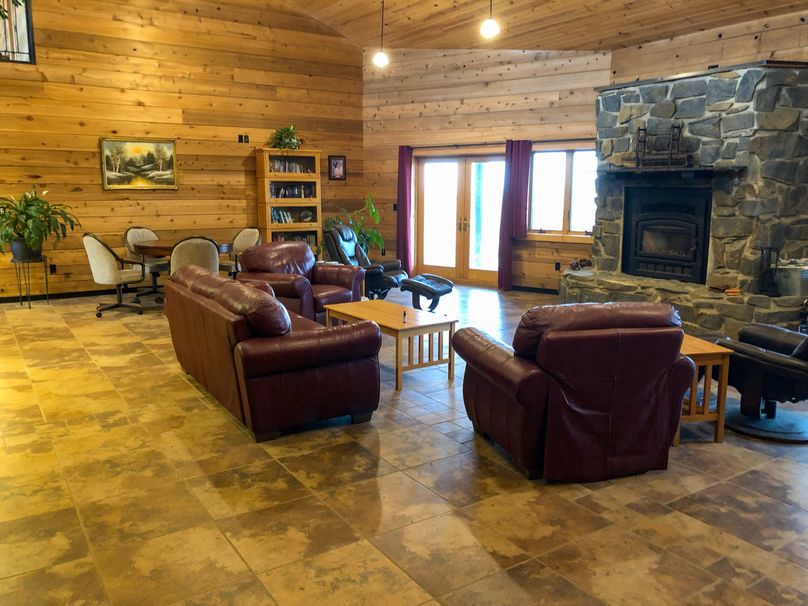 27. lower level living area with wood burning stove