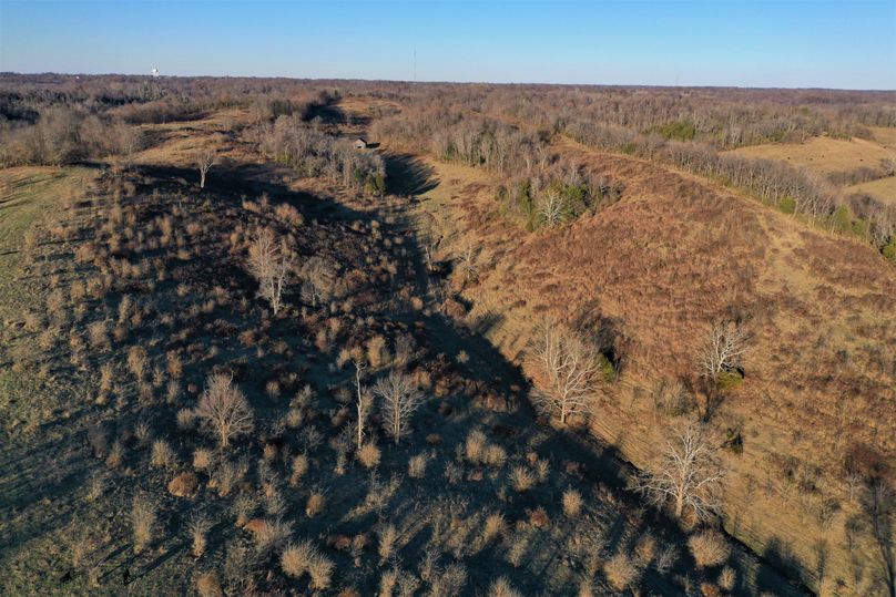 027 aerial drone shot from the middle of the property looking north up the center valley