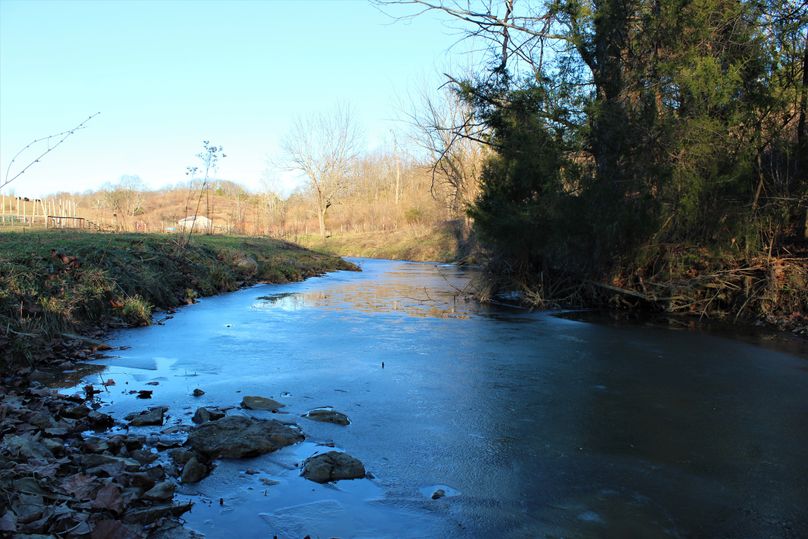 002 the stream flowing north to south originating on the property