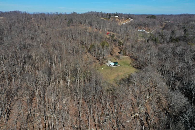 031 aerial drone shot from the center of the property looking to the east