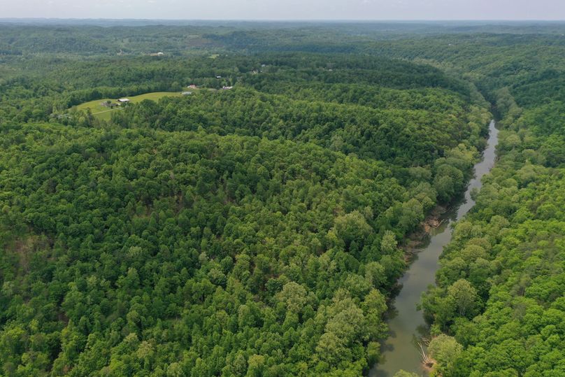 020 aerial drone shot from the north boundary looking southwest along the river