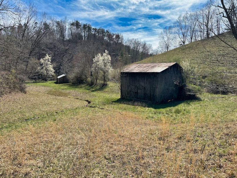 007 awesome shot looking back towards the barn, old home, and road