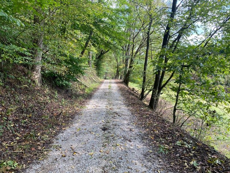 003 the county gravel road at the northeast west corner of the property near the entrance