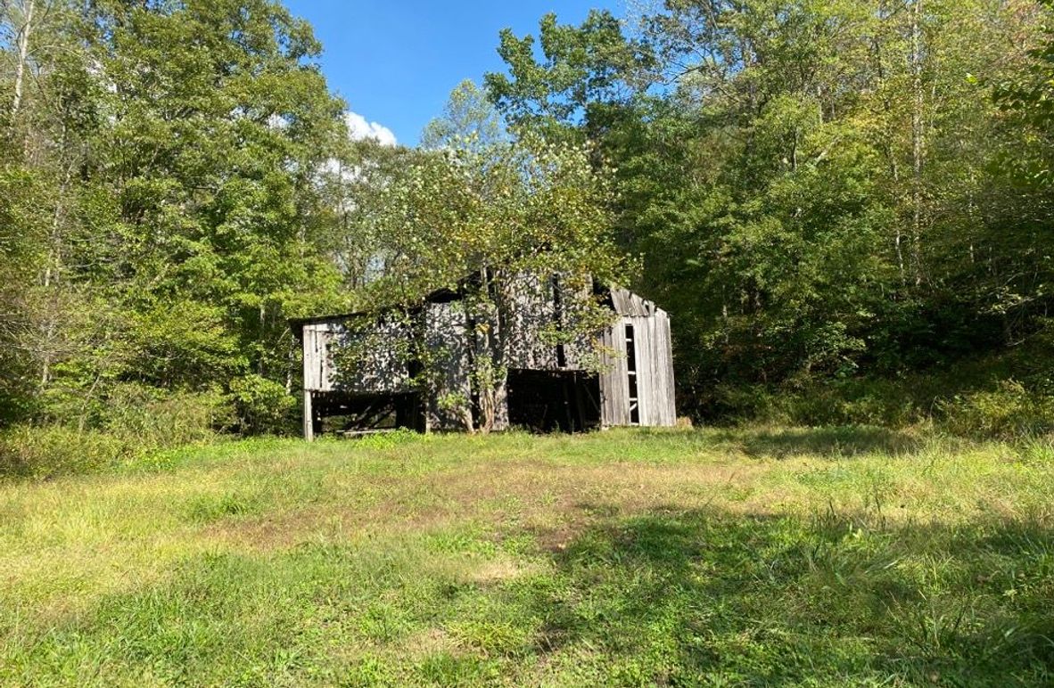 004 the barn that stands near the road at the northwest area of the property