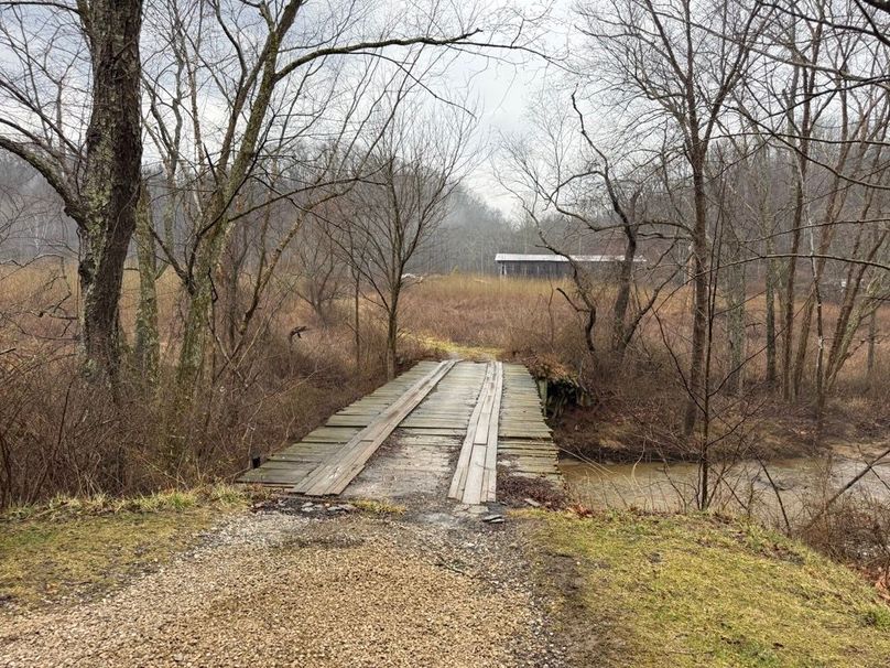 016 the bridge leading across the creek to the property
