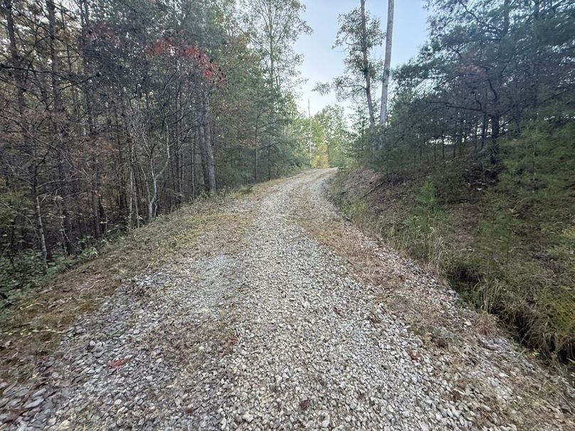 016 the gravel drive just after passing the locked cabled entrance