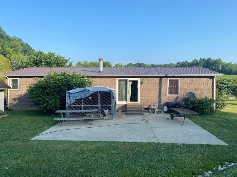 028 back view of the home with the large carport copy