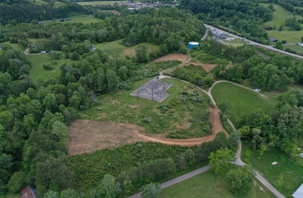 001 aerial drone shot from the north looking straight south over the property