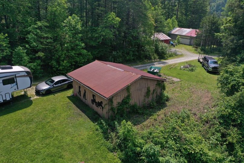 036 the backside of the open front garage carport-2