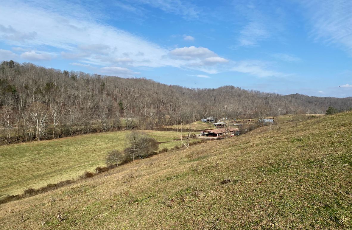 002 ground level view of the west section of the property looking north toward the barns and structures copy
