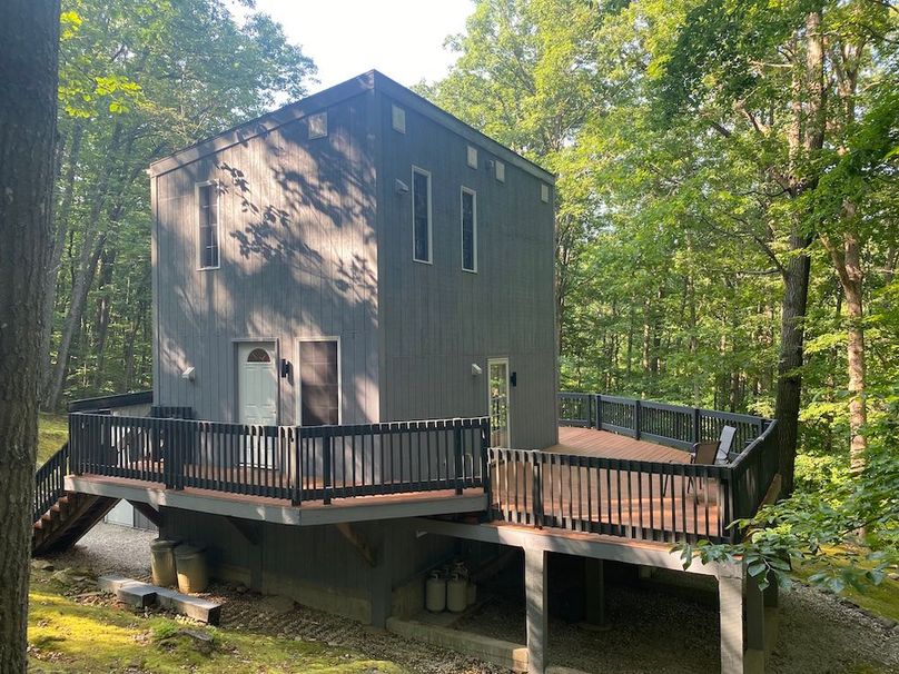 023 view of the home from the back left corner with the deck copy