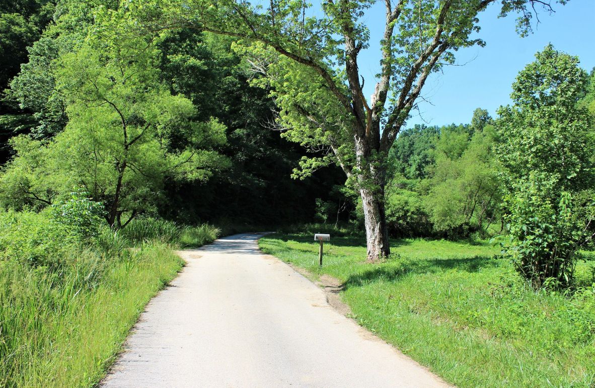 004 the county blacktop road along the east boundary