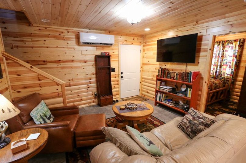035 another angle of the living room area and view of the door leading into the garage