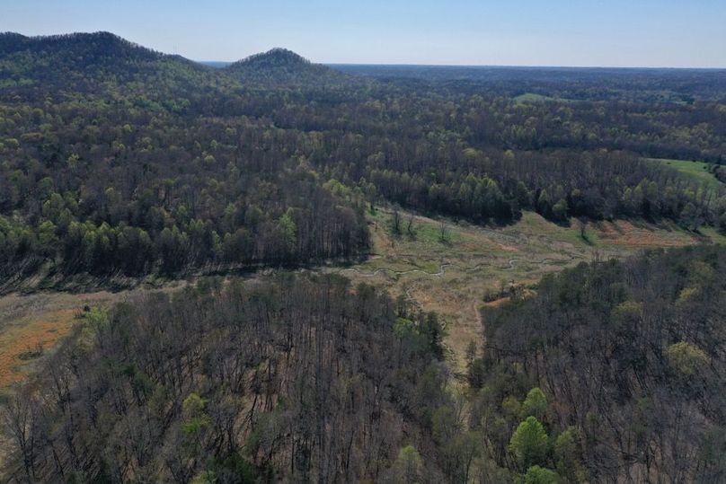 021 aerial drone view at the northeast corner of the property looking west