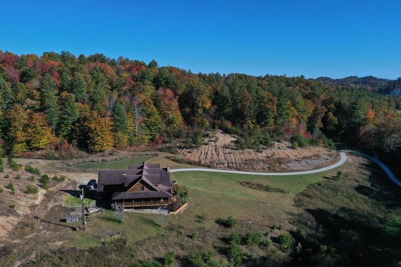 028 aerial drone shot of the log home from the northwest side