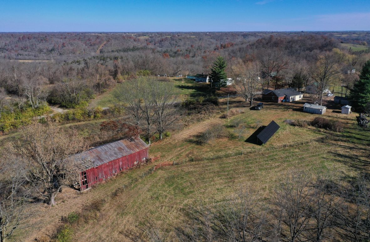 004 aerial drone shot of the home, barn and other buildings