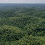 001 aerial drone shot from the center of the property looking southwest