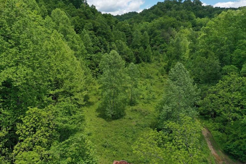 024 low elevation drone shot of the field areas in the south area of the property