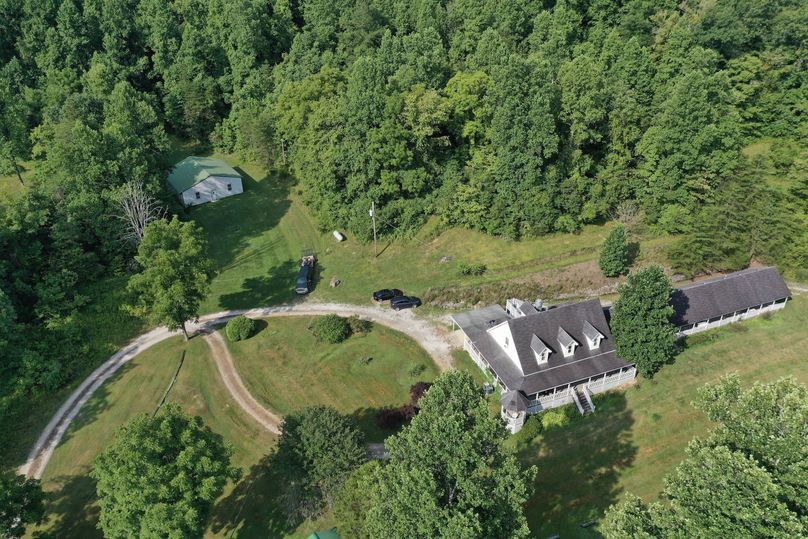 010 mid altitude drone shot of the home and adjacent structures