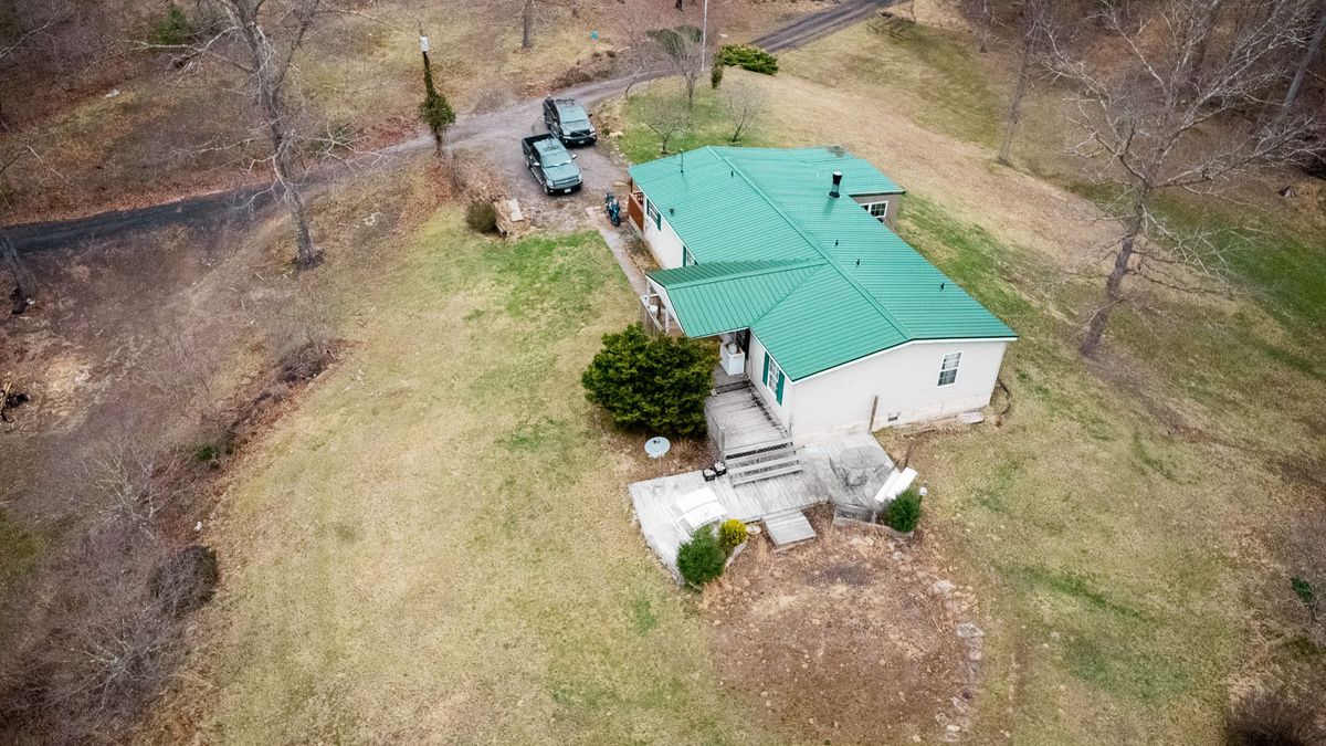 Secluded Country Home With Stream And Useable Acreage In The Western