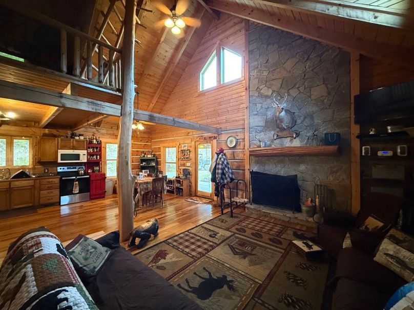 045 view across the living room towards the kitchen area from the stairs leading up to the upper level