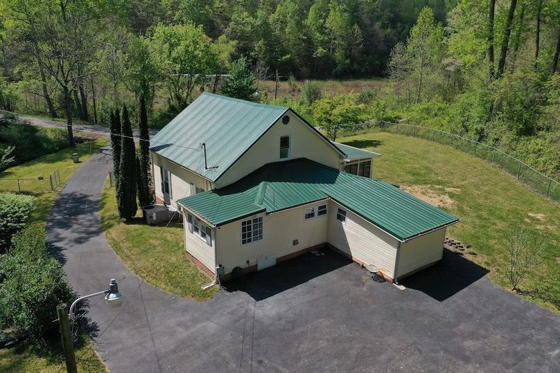 024 low elevation drone shot of the back of the home