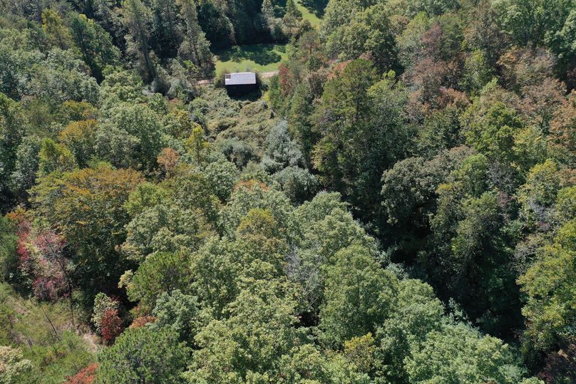 015 low elevation drone shot of the barn and south area of the property