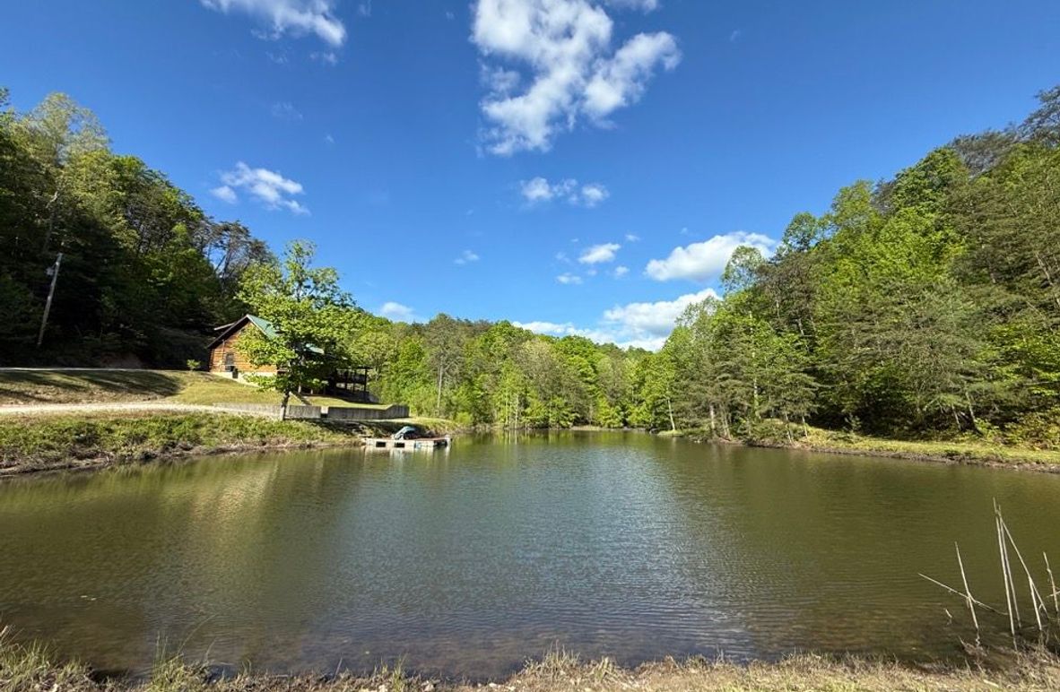 001 beautiful view of the pond and cabin from the dam of the pond