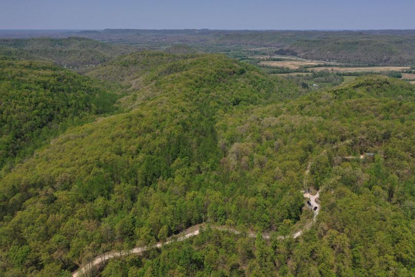 002 aerial drone shot from the south boundary looking north down the valley toward Stanton