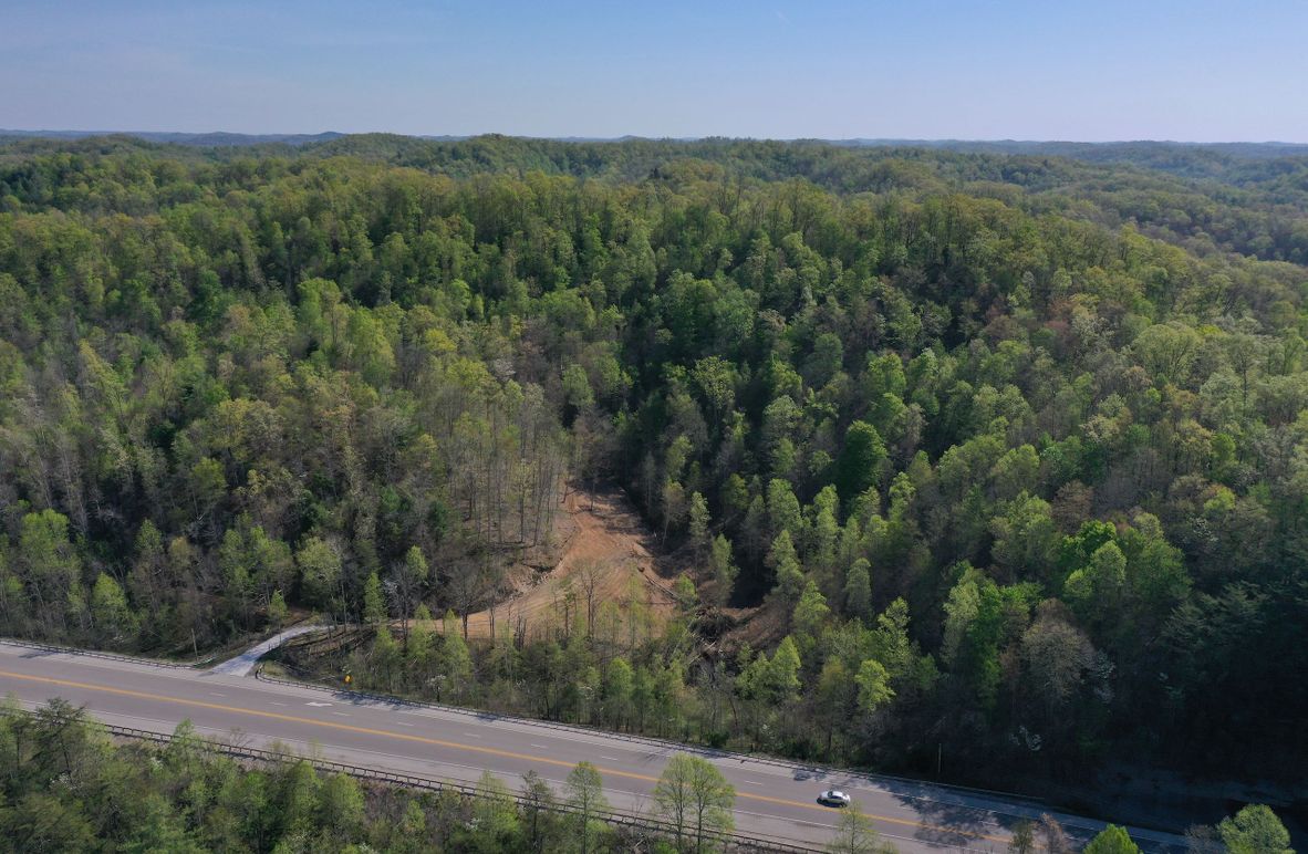 001 aerial drone shot from the KY 15 looking east across the property