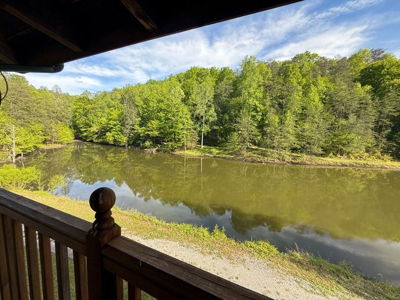 033 view from the front porch looking to the southeast up to the head of the pond