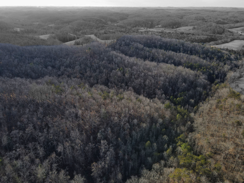 030 aerial shot looking west towards the creek and over the rolling hills